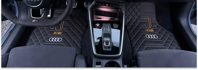 Vyšívaní koberečku Audi